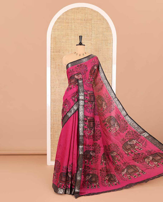 Pink plain muslin cotton saree, contrast wedding-theme of floral and elephant motifs print, printed pallu, and a contrast buttas and zari bordered blouse