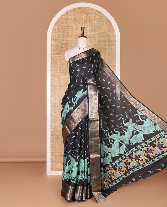 Black-Rama green dargon fly and cranes motifs printed dola silk saree, contrast gold zari border, Mughal floral printed pallu, and dragon fly printed blouse