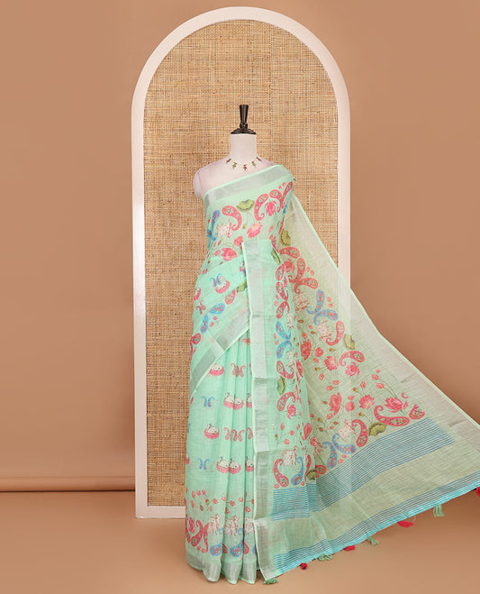 Apple green Pichwai Lotus, cow, and paisleys printed linen cotton saree, silver zari border, striped pallu and plain blouse