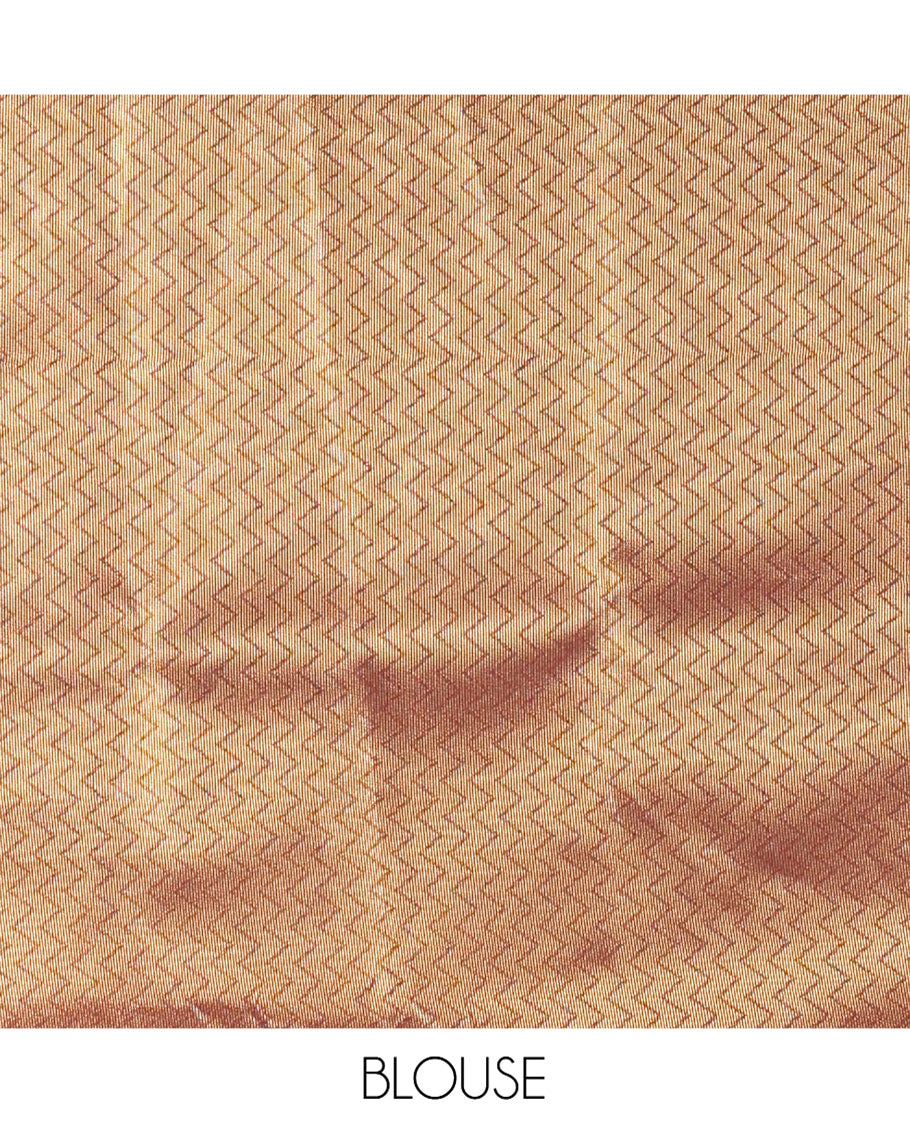 Brown Kanchi Silk Saree, Mesmerized with Zari Buttas All Over Its Body, Highlighted by Zari Checked Border, a Grandly Decked Up Pallu, and Paired with a Chevron Jacquard Blouse