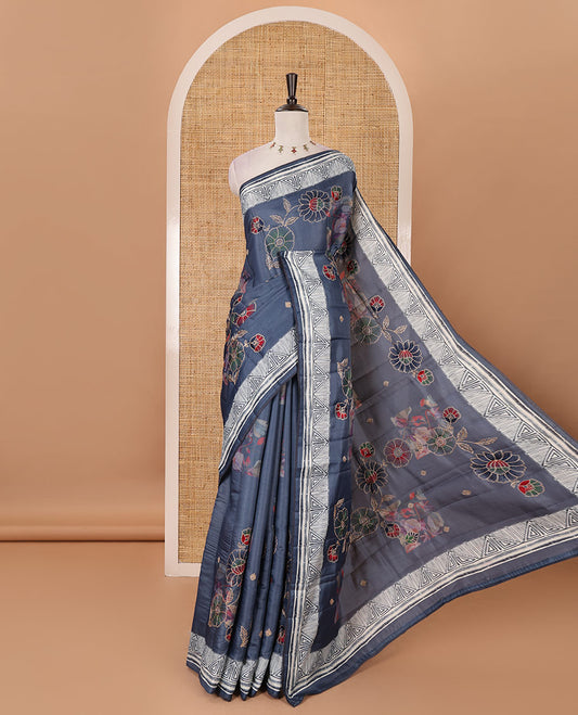 Navy floral print & multi-color floral thread embroidered fancy tussar silk saree, triangle motif print & embroidered border & matching blouse of print & embroidery