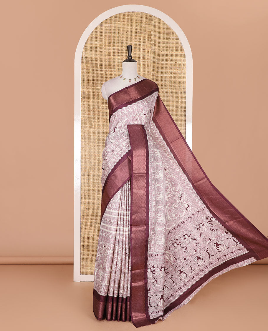 Cream and wine Madhubani village theme characters printed soft tussar saree, contrast traditional zari border, Madhubani printed pallu, and a matching blouse