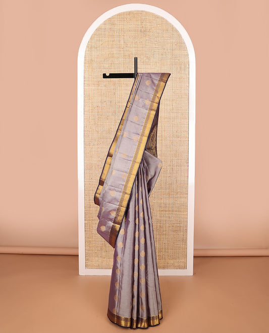 Grey striped, floral buttas vasundhara elite silk saree with contrast traditional zari design border & floral jaal design pallu