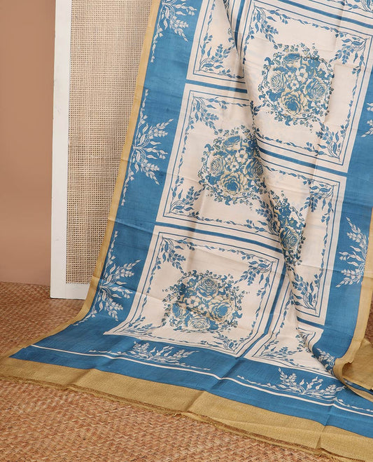 Cream with blue floral design printed silk saree with contrast border