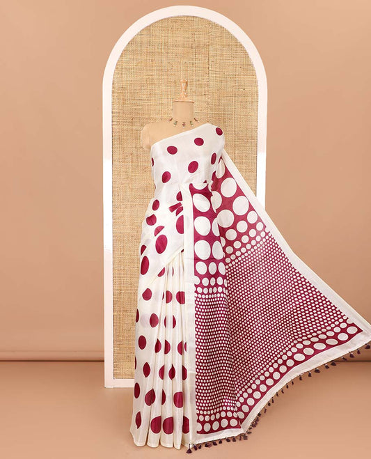Borderless cream and purple polka dots printed art khadi cotton saree, pallu steeped with polka dots, and a contrast tiny polka dots printed blouse