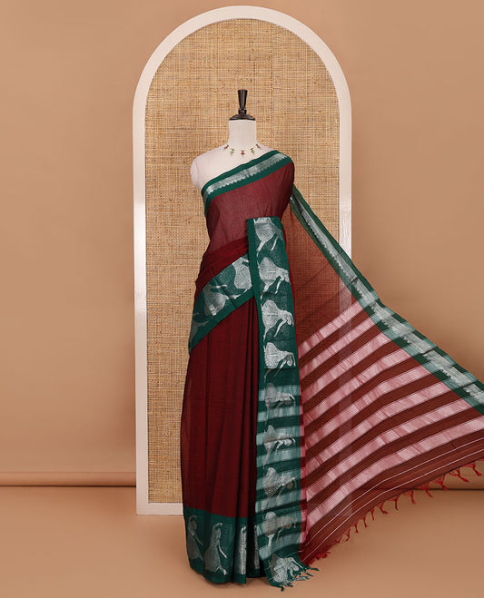 Maroon full-plain Mercerised cotton saree, contrast sliver zari Dancing Bharatanatyam girl motifs woven border, striped pallu & plain blouse