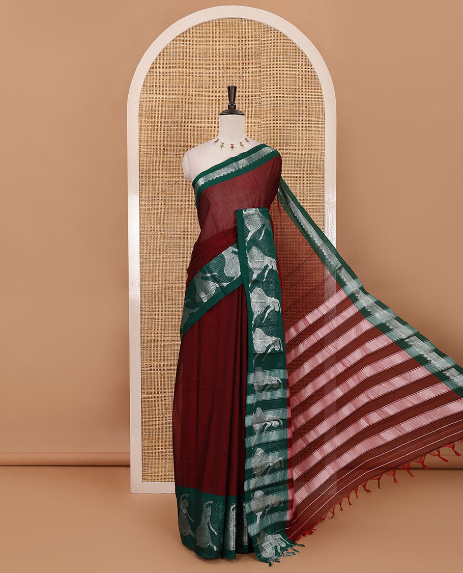 Maroon full-plain Mercerised cotton saree, contrast sliver zari Dancing Bharatanatyam girl motifs woven border, striped pallu & plain blouse