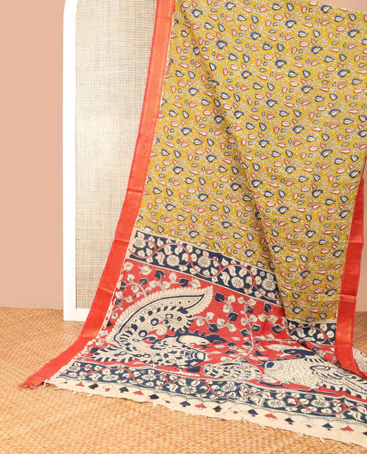 Mustard floral vine design machine-printed kalamkari cotton saree with contrast border of zari design & animal motif pallu