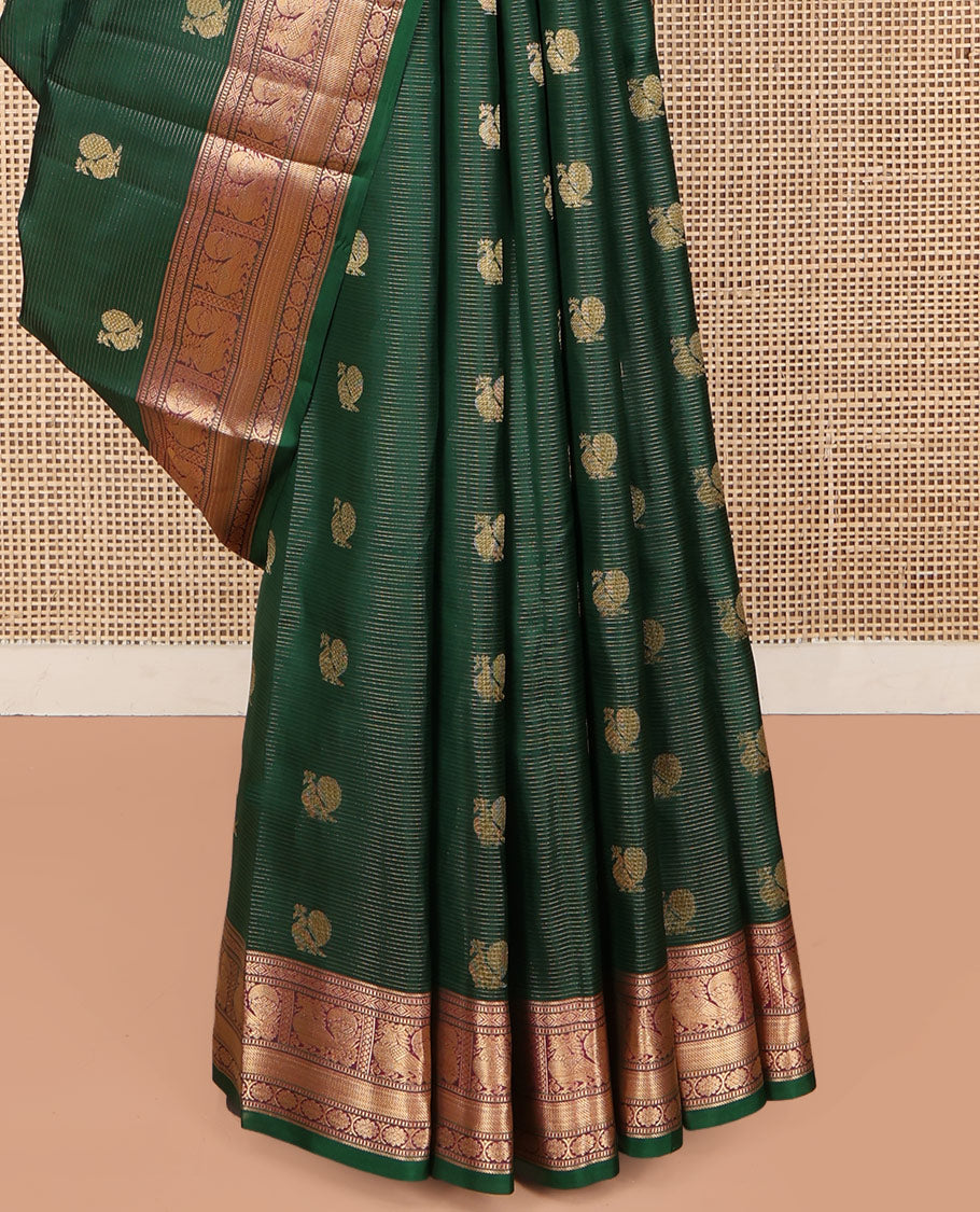 Green Kanchipuram Silk Saree, Beautified with Mayil Buttas and Zari Stripes on Its Body, Complemented by Contrast Border of Muthu, Diamond, Mayil, and Laddu Kamalam Designs, Diagonally Striped Pallu, and Paired with a Contrast Blouse
