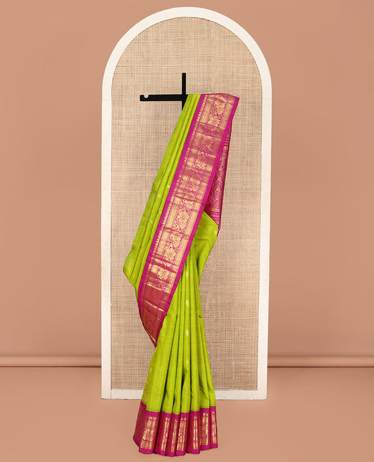 Green Kanchipuram Silk Saree, Sparsely Woven with Zari Buttas on Its Body, Complemented by a Contrast One-Sided Korvai Border of Manga Mokku, Banaras, Diamond and Kodi Visiry Designs, Pallu of Floral Jaal Designs, and Comes Without a Blouse