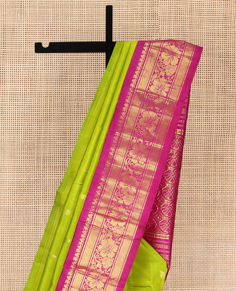 Green Kanchipuram Silk Saree, Sparsely Woven with Zari Buttas on Its Body, Complemented by a Contrast One-Sided Korvai Border of Manga Mokku, Banaras, Diamond and Kodi Visiry Designs, Pallu of Floral Jaal Designs, and Comes Without a Blouse