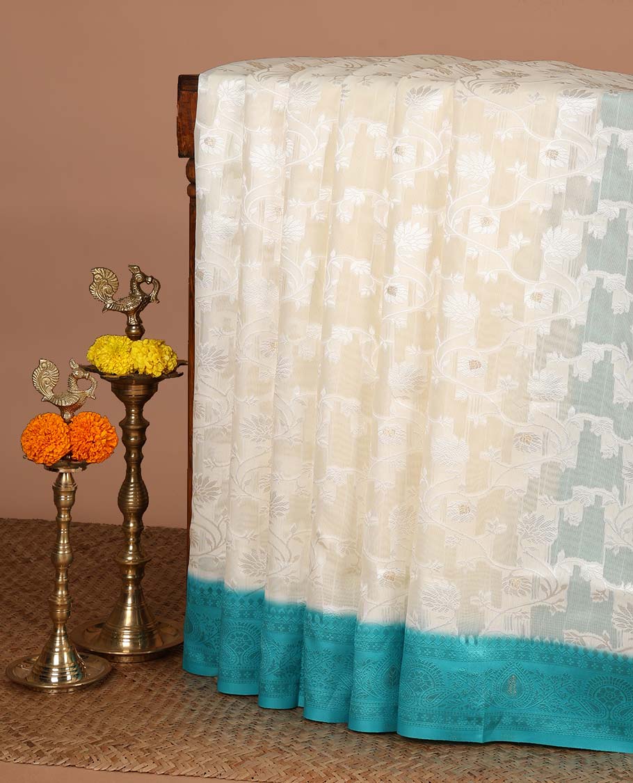 Cream with rama color thread weaving, zari butta banaras brasso saree with contrast thread border & thread weaving pallu along with butta design blouse
