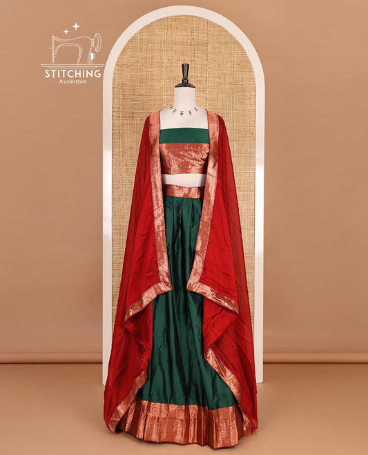 Dark green taffeta silk half saree, plain with contrast red traditional zari border, matching zari blouse, and contrast plain zari border dhavani