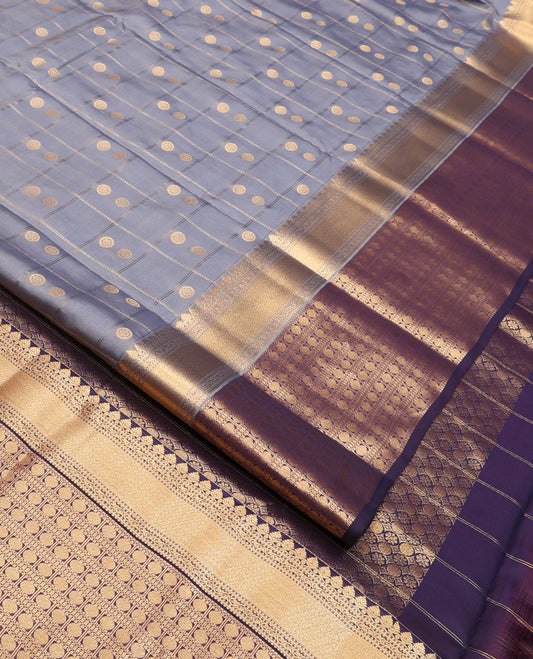 Grey Vasundhara Lite Silk Mix Saree, Artfully Woven with Chakram Butta Enclosed Checks, Complemented by Contrast Border Steeped with Poun Designs, Grand Pallu and Paired with a Contrast Blouse