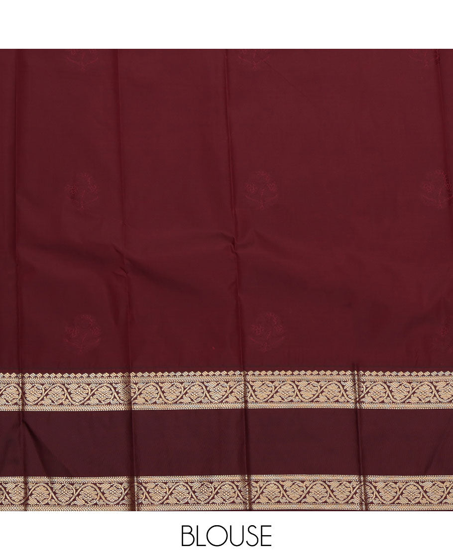 Red Budget Silk Saree, Accentuated with Zari Buttas All Over Its Body, Complemented by a Contrast Traditional Zari Rettai Pettu Border of Floral Creeper Designs, Gleaming Jaal Pallu, and Paired with a Contrast Blouse