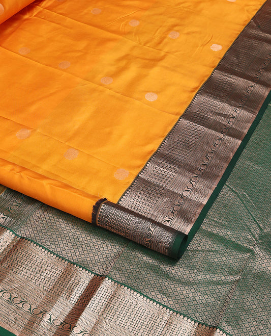 Orange floral buttas silk saree with contrast border of thilakam mokku, muthu, banaras, kathir design & checked zari design pallu