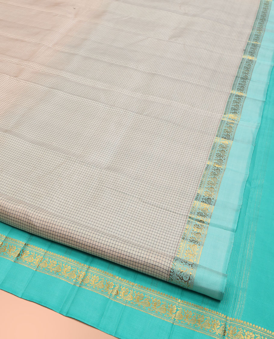 Off-White Kanchipuram Silk Saree, Accentuated with Micro-Checked Design All Over Its Body, Complemented by Contrast Kal Erangina Border of Thilakam Mokku, Banaras, Muthu, and Mayil Designs, Subtly Zari Striped Pallu, and Paired with a Contrast Blouse