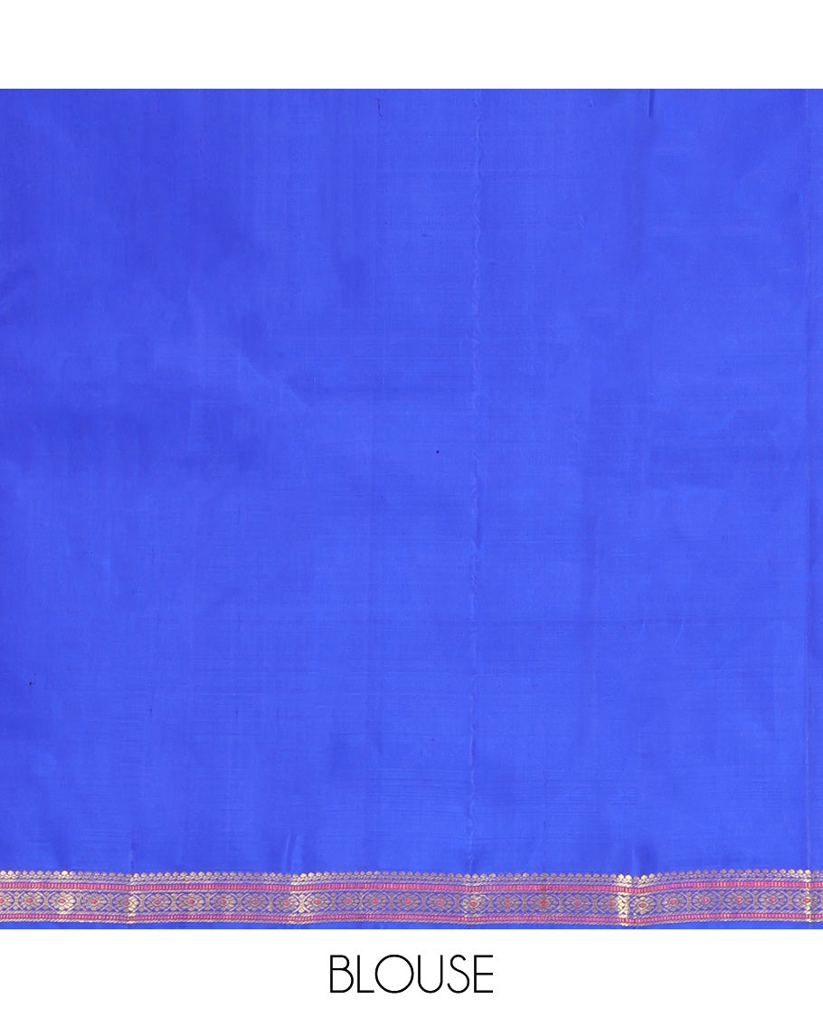 Royal Blue Kanchipuram Silk Saree, Elevated with Zari Buttas All Over Its Body, Highlighted by Zari Border of Salngai, Muthu, and Chakram Designs, Pallu of Mayil Kann Design, and Paired with a Matching Blouse