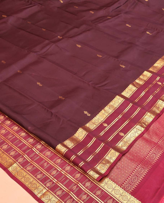 Brown Vasundhara Silk Mix Saree, Adorned with Zari Buttas All Over Its Body, Complemented by Contrast Border of Traditional Zari Designs, Grand Jaal Pallu and Paired with a Contrast Blouse