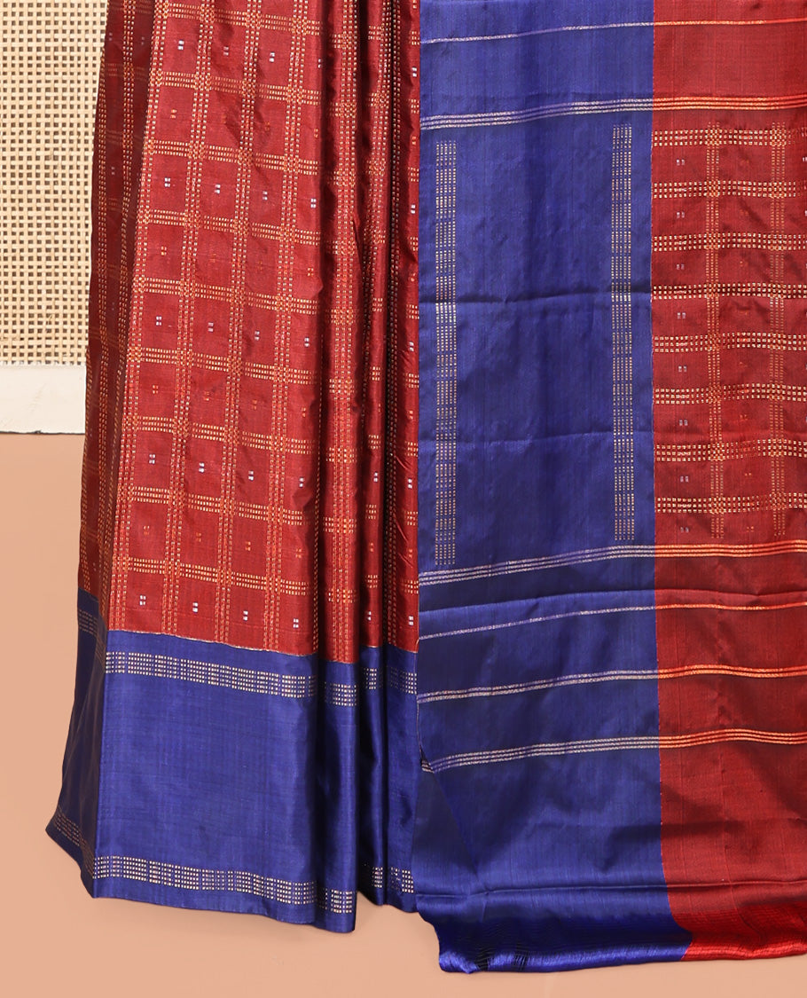 Maroon Arani Saree, Bedecked with Butta Enclosed Checks, a Contrast Bodi Border, Self-Pallu, and a Matching Blouse