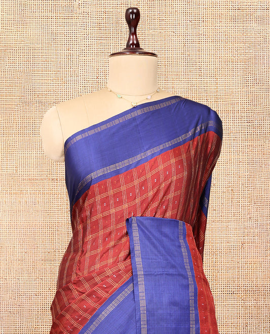 Maroon Arani Saree, Bedecked with Butta Enclosed Checks, a Contrast Bodi Border, Self-Pallu, and a Matching Blouse