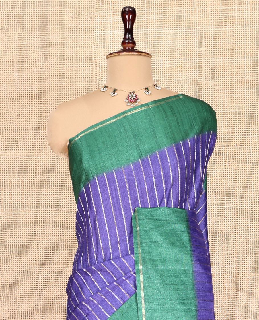 Blue Fancy Tussar Saree, Highlighted by Vertical Zari Stripes Across Its Body, Complemented by Captivating Contrast Geometric Patterned Border, Subtle Pallu and Paired with a Contrast Blouse