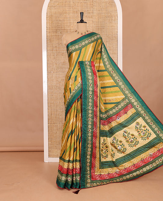 Gold leheriya striped printed, mirror and stone work moss chiffon saree, contrast bandhani printed mirror work border, floral print, mirror and stone work pallu with a contrast plain blouse