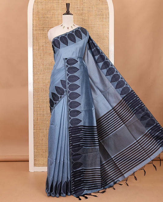 Grey plain jute cotton saree , contrast leaf thread butta border & lining seer pallu with tussels