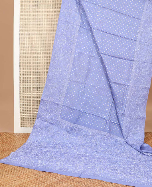 Blue buttas tussar silk saree with self embroidery border & floral thread embroidery pallu