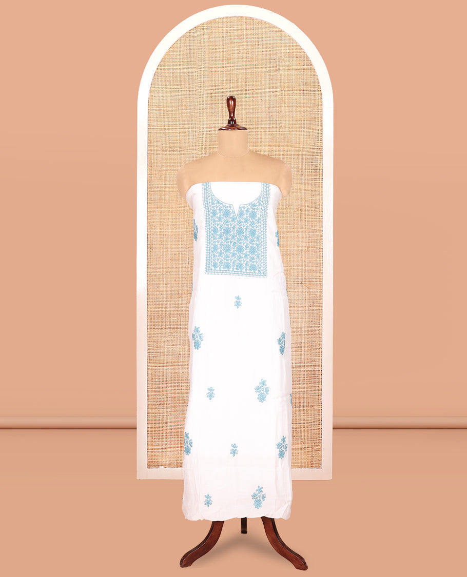 White-Blue Mul Chanderi Material Churidar Features a Floral-Themed Thread-Embroidered Top, a Plain Santoon Bottom, and Thread Embroidered Dupatta
