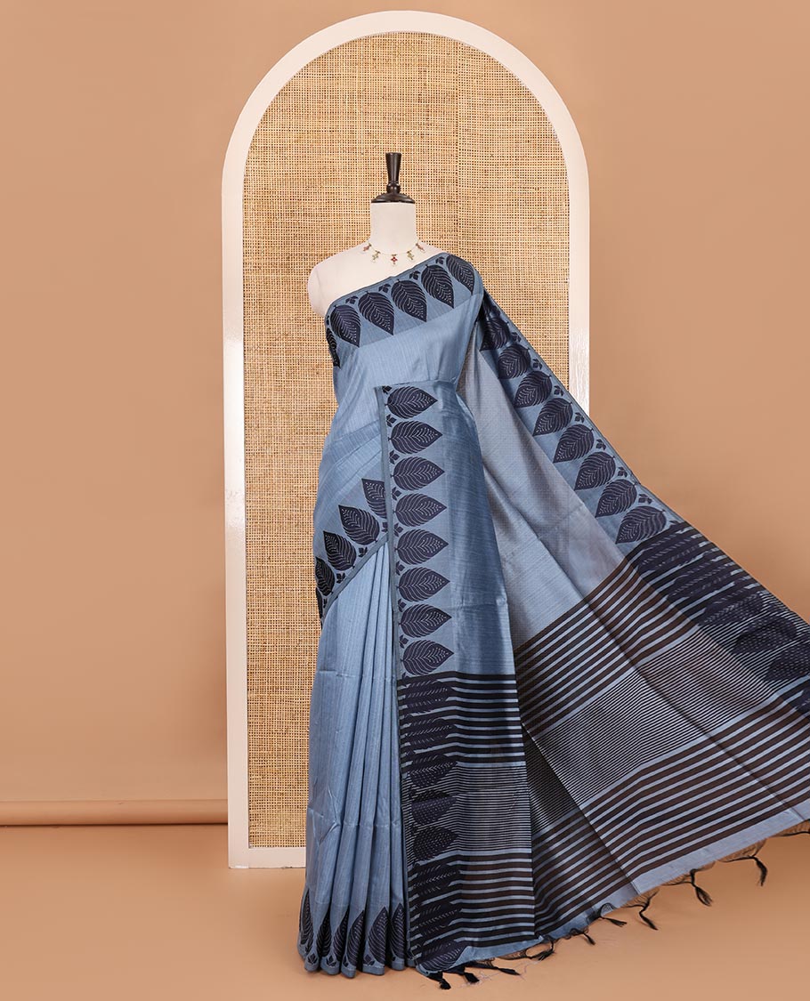 Grey plain jute cotton saree , contrast leaf thread butta border & lining seer pallu with tussels