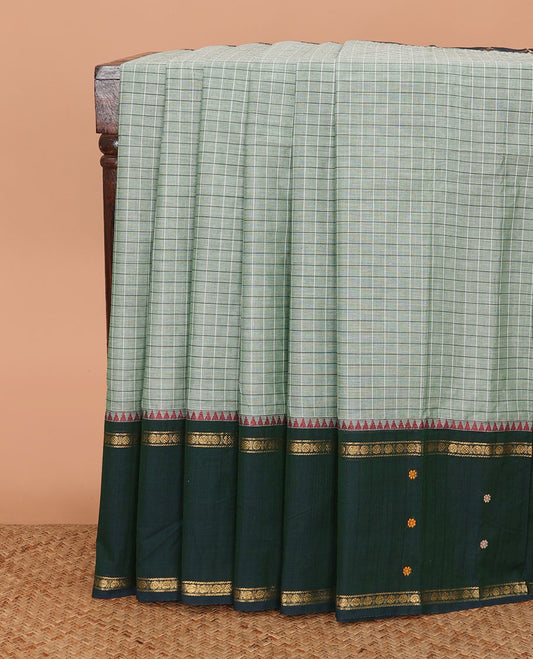 Green micro-checked Chettinad cotton saree, contrast thread and traditional zari border, and striped pallu
