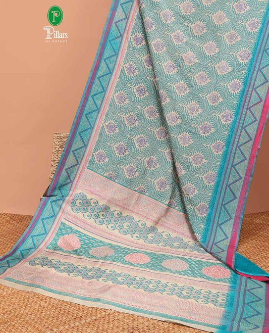 Chiku color discharge print crackle silk saree with contrast border & self plain blouse