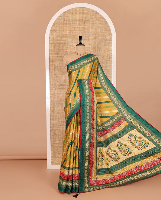 Gold leheriya striped printed, mirror and stone work moss chiffon saree, contrast bandhani printed mirror work border, floral print, mirror and stone work pallu with a contrast plain blouse