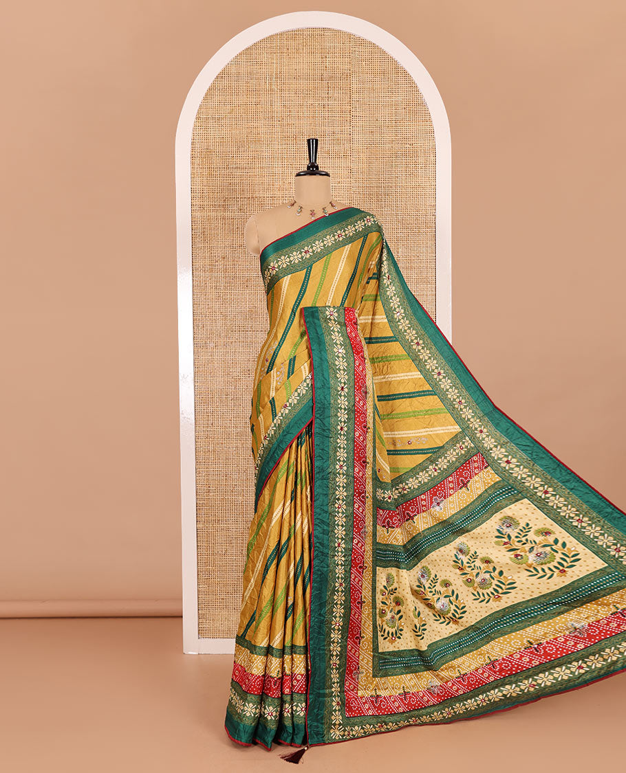Gold leheriya striped printed, mirror and stone work moss chiffon saree, contrast bandhani printed mirror work border, floral print, mirror and stone work pallu with a contrast plain blouse