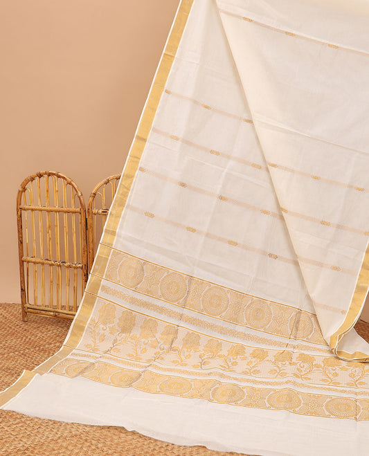 Cream kerala saree with zari stripes, zari border & pallu of floral designs