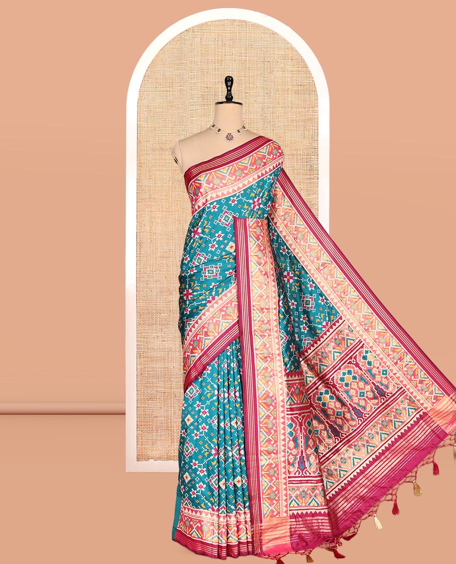 Peacock Green Intricate Motif Semi-Patan Patola Saree, Contrast Patola Tissue Border, and a Contrast Blouse