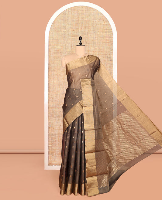 Brown Silk Cotton Saree, Adorned with Buttas, Gleaming Bavanji Border, Pallu Steeped with Stripes, and a Matching Blouse