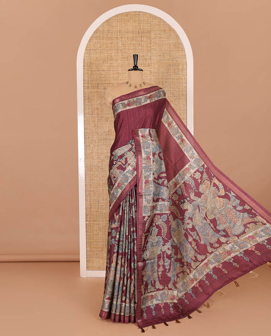 Maroon kalamkari human figurines printed fancy tussar saree, floral printed border, human figurines printed pallu, and a matching blouse