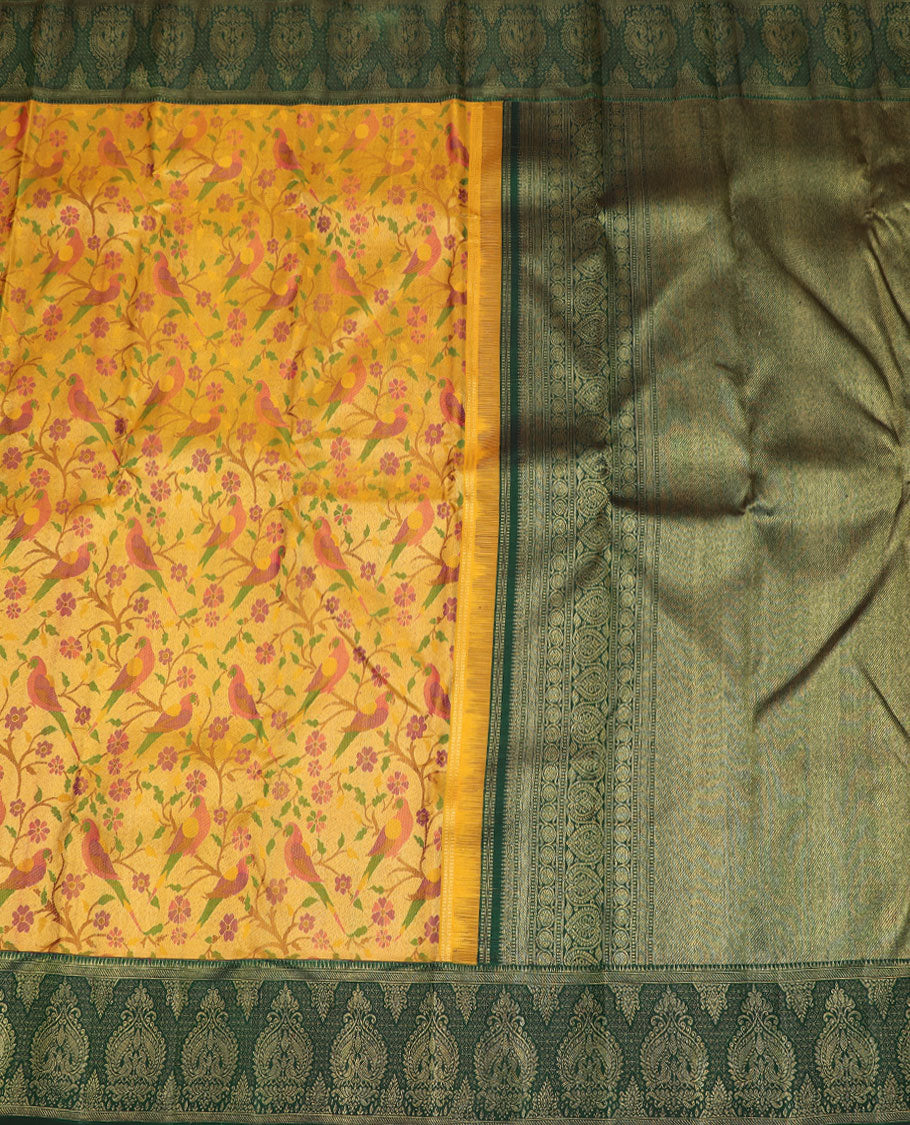 Yellow floral & bird meenakari jacquard silk saree, contrast rekku border of mayil designs & grand zari-rich intricate pallu