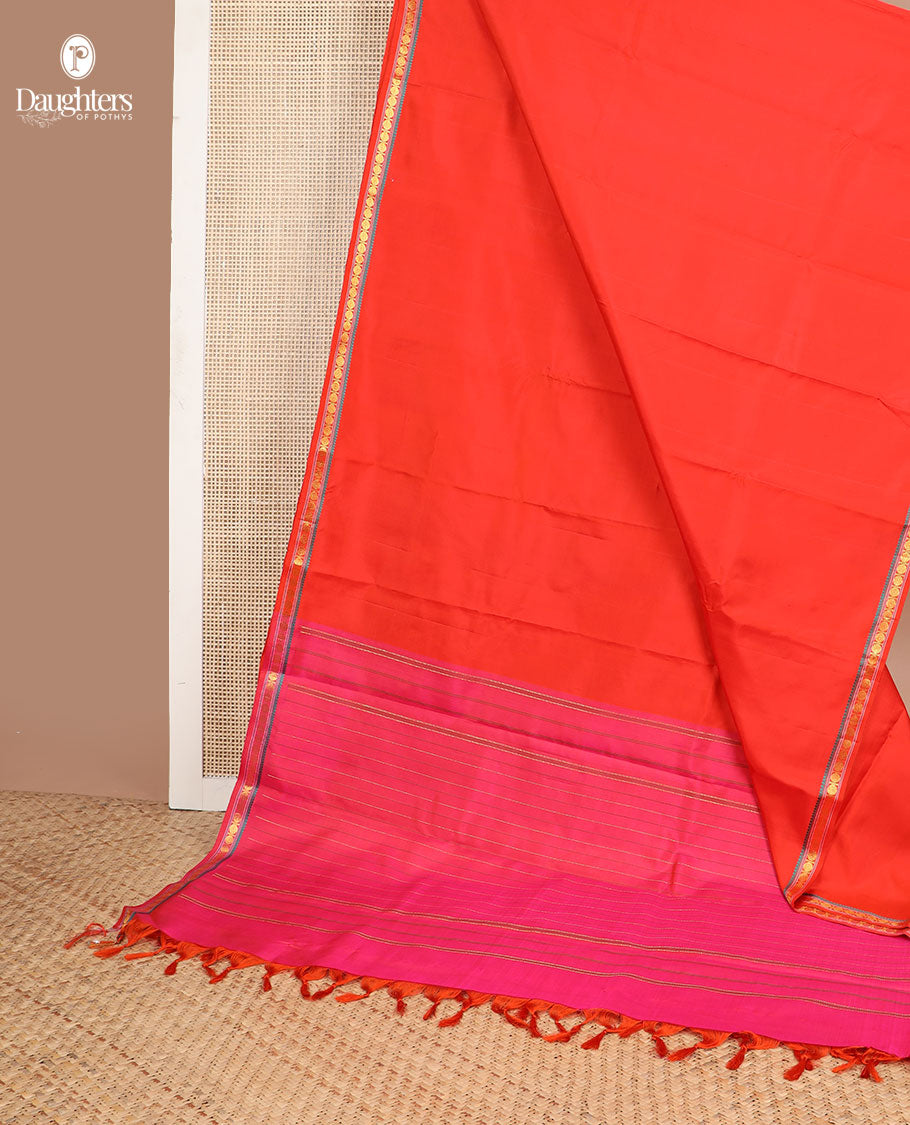 Red kancheepuram silk saree with self border of thilakam mokku, paun design & striped pallu