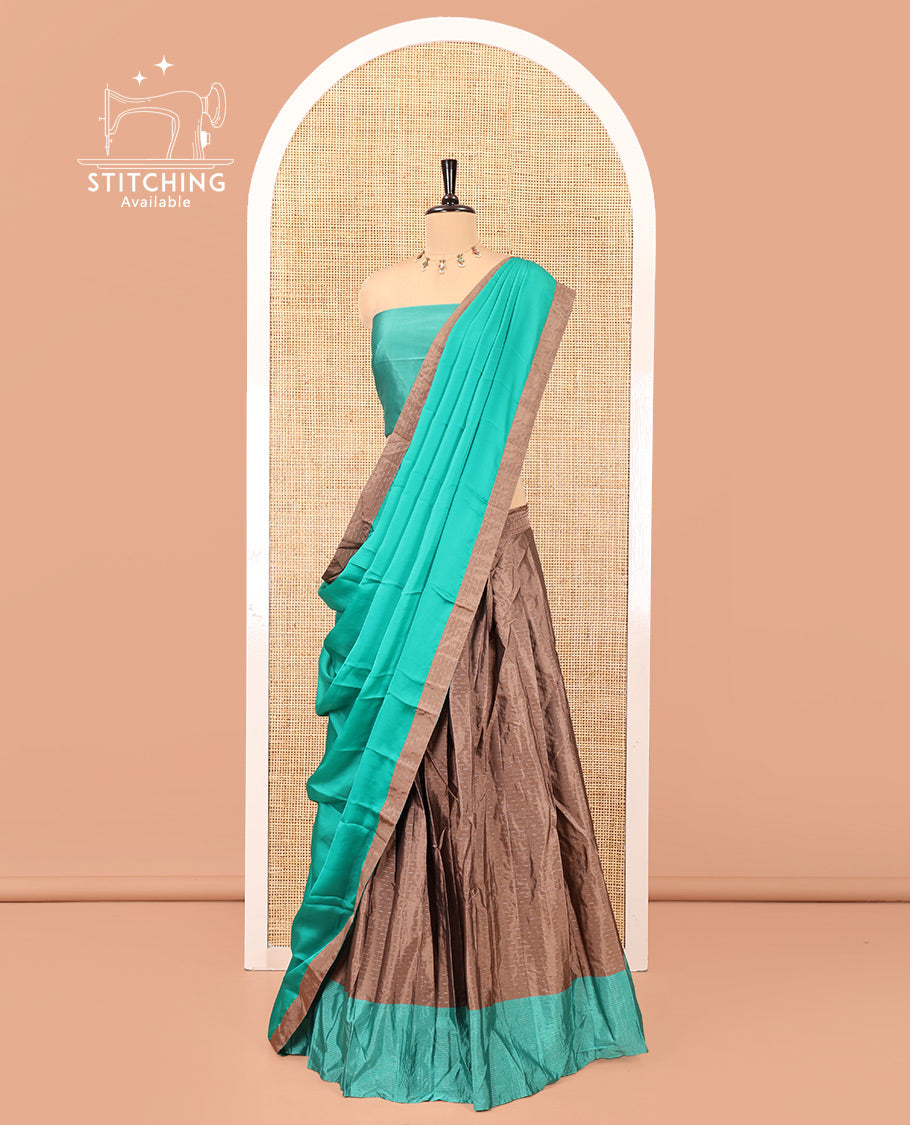 Chocolate Brown and Green Checked Taffeta Silk Half-Saree, Complemented by Contrast Sparsely Striped Border, Paired with a Contrast Blouse, and Comes with Subtle-Bordered Satin Georgette Dhavani