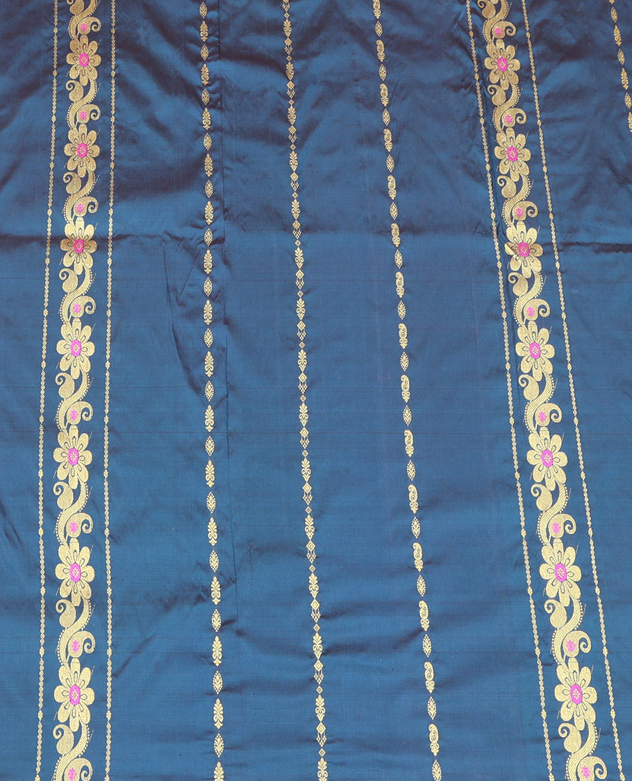 Blue Pure Silk Half-Saree, Adorned with Zari Designs on Its Body, Complemented by a Contrast Floral and Paisley Design Border, Complemented by a Contrast Blouse, and Paired with a Contrast Dhavani of Leaf-Paisley Designs
