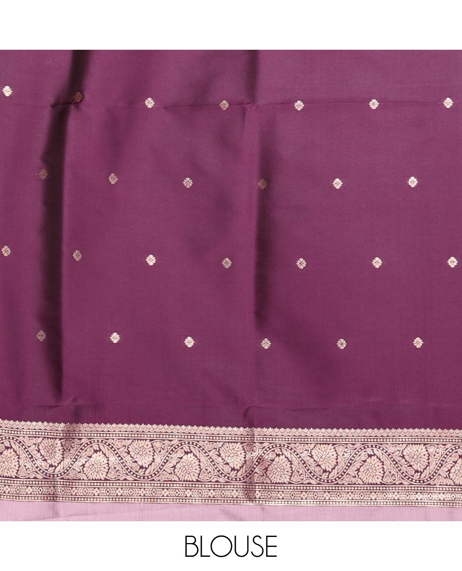 Lavender Elite Soft Silk Saree, Richly Detailed with Zari Buttas and Zari Stripes All Over Its Body, Complemented by a Contrast Temple Border of Round Peacock Designs, Rich Pallu of Peacock Chakram Butta Enclosed Checks, and Paired with a Contrast Blouse