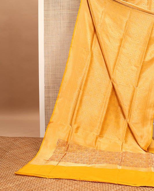 Yellow floral jacquard with self intricate zari design border & floral zari design pallu
