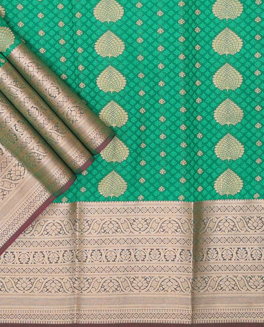 Green leaf design art silk pavadai material with contrast traditional zari design border & floral zari design blouse