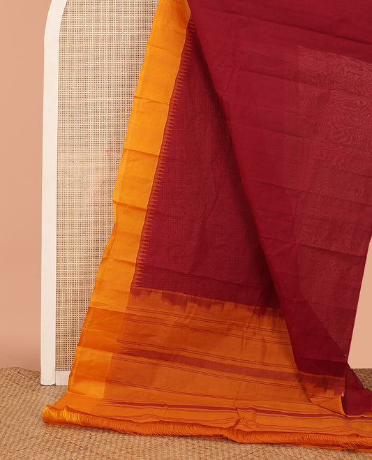 Maroon Plain Kanchi Cotton Saree, Complemented by a Contrast Temple Border, Subtly Striped Pallu, and Paired with a Contrast Blouse