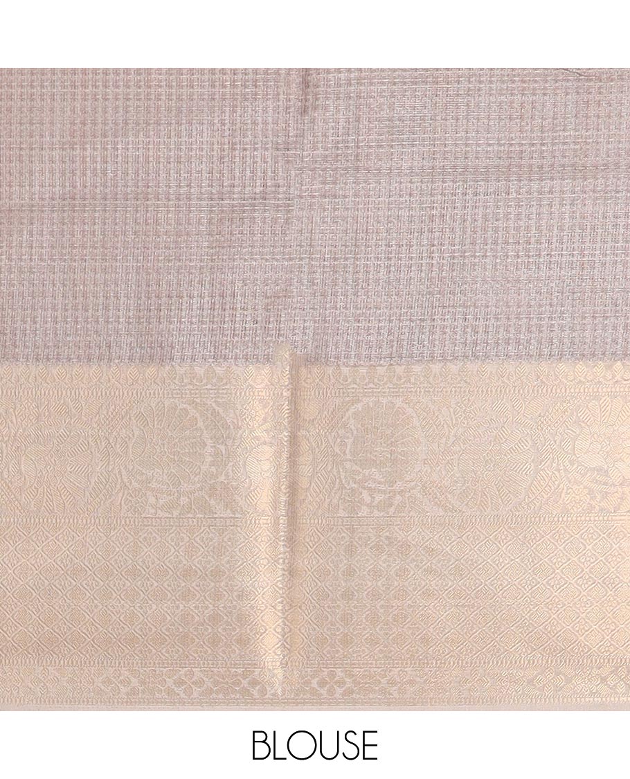 Cream all-over animal, fifure motif digtal printed with contrast gold zari jacquard border & printed rich pallu along with contrast plain blouse