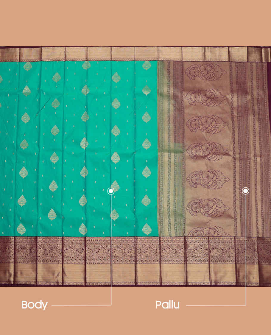 Green Budget Silk Saree, Adorned with Buttas, Complemented by a Contrast Traditional Zari Border, Grand Pallu, and Contrast Blouse