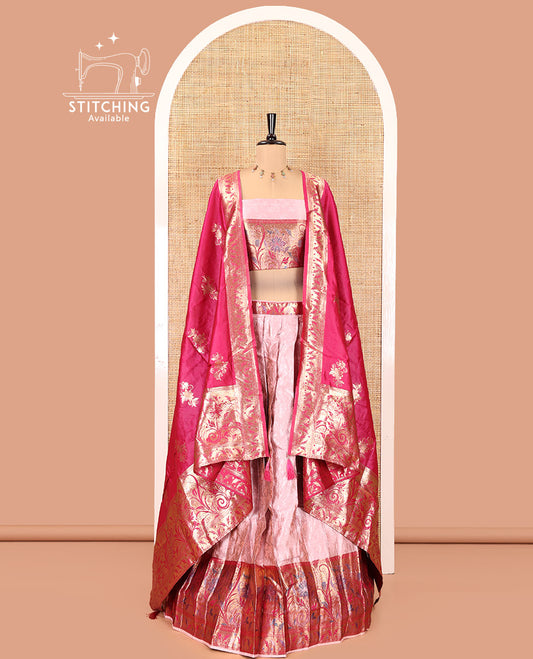 Onion Pink and Rani Pink Half-Saree Set, Subtly Sparkled with Floral Vine Design on Its Banarasi Skirt, Complemented by Contrast Meenakari Floral Design with Embroidered Border, Matching Blouse, and Paired with a Banaras Dupatta